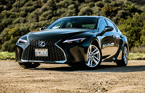 a car driving down a dirt road