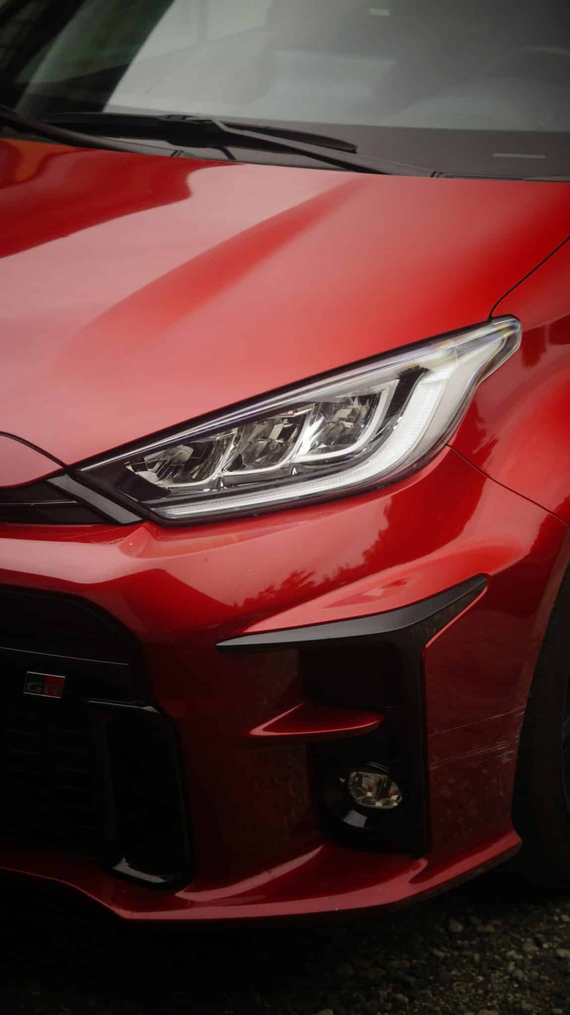 a car with a helmet on a table