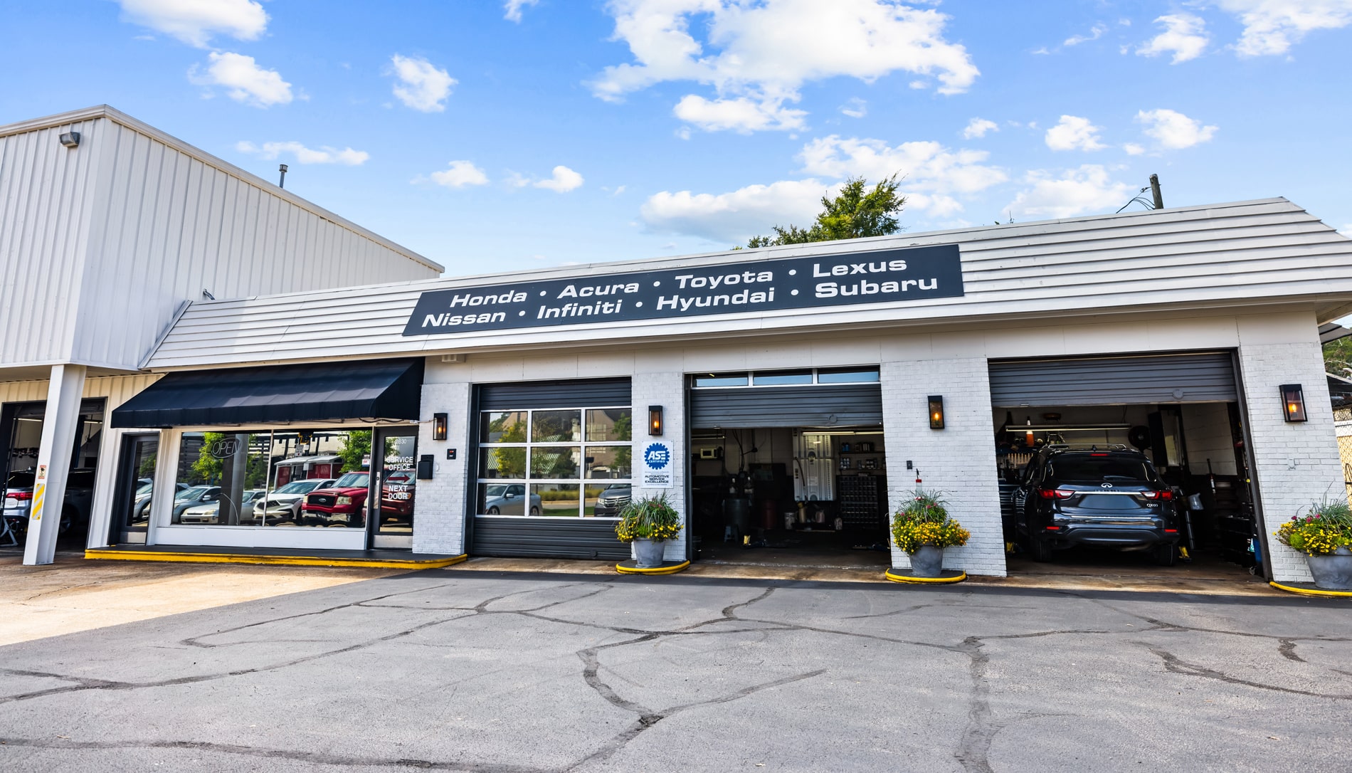 a building with a store on the side of a road