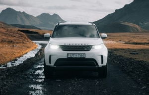 a car parked on the side of a mountain