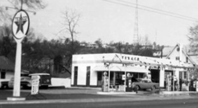 a sign on the side of a road
