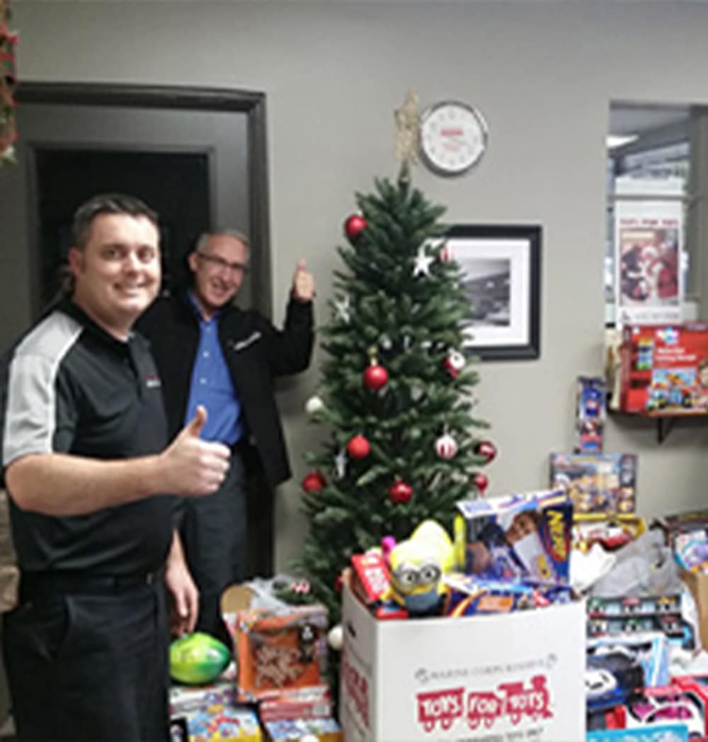 a group of people standing in a room
